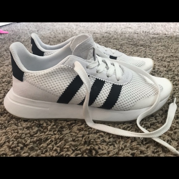 adidas white tennis shoes with black stripes